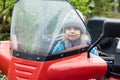 Portrait of young boy on quad bike Royalty Free Stock Photo