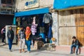 Front view of Tibetan shop clothes and souvenirs outside the tourist town of Leh, India. Royalty Free Stock Photo