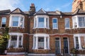 Exterior of Brick Terraced Houses on a Sunny Fall Day Royalty Free Stock Photo