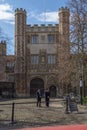 Front view at the Trinity College Great Gate building, exterior facade, security guards guarding the exterior building Royalty Free Stock Photo