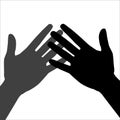 Front view of two crossed human hands.Silhouette of clapping hands.