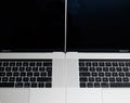 Front view of Two new professional Apple MacBook Pro 16 15 laptops Royalty Free Stock Photo