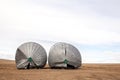 Two toppled over steel grain bins Royalty Free Stock Photo