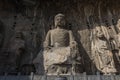 Front view of Vairocana Buddha in Fengxian Temple, the biggest cave of Longmen grottoes, Luoyang, Henan, China Royalty Free Stock Photo