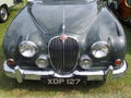 Front view of a vintage grey jaguar mark 2 1960s british luxury touring car at hebden bridge vintage weekend