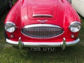 Front view of a vintage red Austin-Healey 3000 mark 2 1960s british sports car Royalty Free Stock Photo