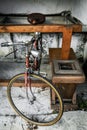 Front View of Vintage 1970s Bicycle in Rustic Warehouse Scene Royalty Free Stock Photo
