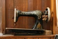 Germany, Lower Saxony, Hambuehren, 23 of April 2022. Antique hand SINGER sewing machine. Very old, dusty, broken covered with