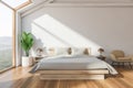 Front view of white attic bedroom Royalty Free Stock Photo