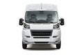 Front view of a white delivery van isolated on a white background, showcasing its windshield, headlights, bumper, and Royalty Free Stock Photo