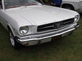 Front view of a white 1960s ford mustang american car at hebden bridge vintage weekend