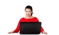 Front view woman sitting at the desk with laptop Royalty Free Stock Photo