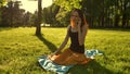 Woman talking by selfphone call outdoors in the park