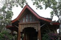 Front view of wooden small house in traditional Indonesian style with terrace. Lombok, Indonesia Royalty Free Stock Photo