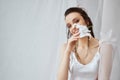 Portrait of smiling girl with lily flower. Royalty Free Stock Photo