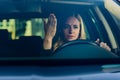 Young frustrated woman driving car Royalty Free Stock Photo