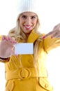 Front view of young woman showing business card Royalty Free Stock Photo