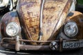 Front of a Volkswagen Beetle model, 1965, dark brown on display in the city of Salvador, Bahia