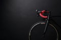 Front and wheel of black race road bike Royalty Free Stock Photo