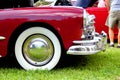 Front wheel of burgundy classic car Royalty Free Stock Photo