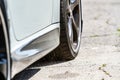 Front wheel, door, sills of a gray car. Rear view of the car. Horizontal orientation. High quality photo Royalty Free Stock Photo