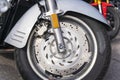 The front wheel of a motorcycle, a side view of the front wing of a motorcycle Royalty Free Stock Photo