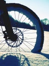 The front wheel of mountain bike stay in powder snow, deep snowdrift. Royalty Free Stock Photo