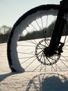 The front wheel of mountain bike stay in powder snow, deep snowdrift. Royalty Free Stock Photo