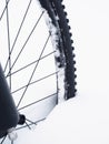 The front wheel of mountain bike stay in powder snow. Lost path Royalty Free Stock Photo