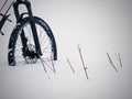 The front wheel of mountain bike stay in powder snow. Lost path Royalty Free Stock Photo