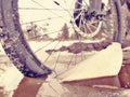 Front wheel of mtb blocked in ivy pool, extreme cycling in winter landscape. Broken ice floe Royalty Free Stock Photo