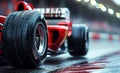 front wheel of red Formula one racing car at start of race Royalty Free Stock Photo