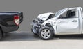 Front White color pack up car crash with back side black color car get damaged by accident on road. Save with clipping path Royalty Free Stock Photo