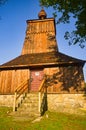 Front of the Wooden church of Saint Michael the Archangel in Prikra during summer sunset Royalty Free Stock Photo