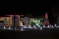 Front yard with brightly illuminated christmas decorations. Outside decor of florida family home for winter holidays Royalty Free Stock Photo