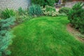 Front Yard Landscaping. A beautifully manicured front yard with a garden full of perennials and annuals. Royalty Free Stock Photo