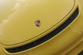 The front of a yellow Porsche Spyder