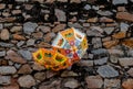 Front zoom in shot of two beautiful designer umbrellas hanged on a wall to display for sale