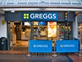 The frontage of a branch of British bakery chain Greggs. It specialises in savoury products such as pies, sausage rolls