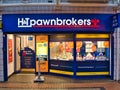 The frontage of a branch of H and T Pawnbrokers. Established in 1897, the company has more than 270 shops in the UK Royalty Free Stock Photo