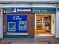 The frontage of a branch of the Nationwide Building Society. Two automated teller machines (ATMs) are available for use