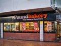 The frontage of a branch of the Poundbakery chain which specializes in savoury products such as pies, pasties, sausage rolls