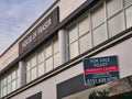 The frontage of a closed House of Fraser store in Birkenhead, UK, with a sign advertising that the property is for sale or to let Royalty Free Stock Photo