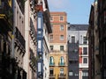 Frontage of colorful buildings in Bilbao city in Spain