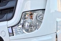 Frontal lighting products for on-highway vehicles, which includes integrated daytime running lights and beam patterns. Bi-Xenon