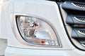 Frontal lighting products for on-highway vehicles, which includes integrated daytime running lights and beam patterns. Bi-Xenon