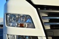 Frontal lighting products for on-highway vehicles, which includes integrated daytime running lights and beam patterns. Bi-Xenon