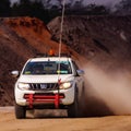 A frontal shot of a speeding light truck at the mining site Royalty Free Stock Photo