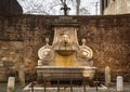 Frontal view of the ancient Fountain of the mask fontana del ma