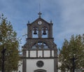 Frontal view of bell tower of Iglesia de San Roque church in Firgas town, Gran Canaria, Spain